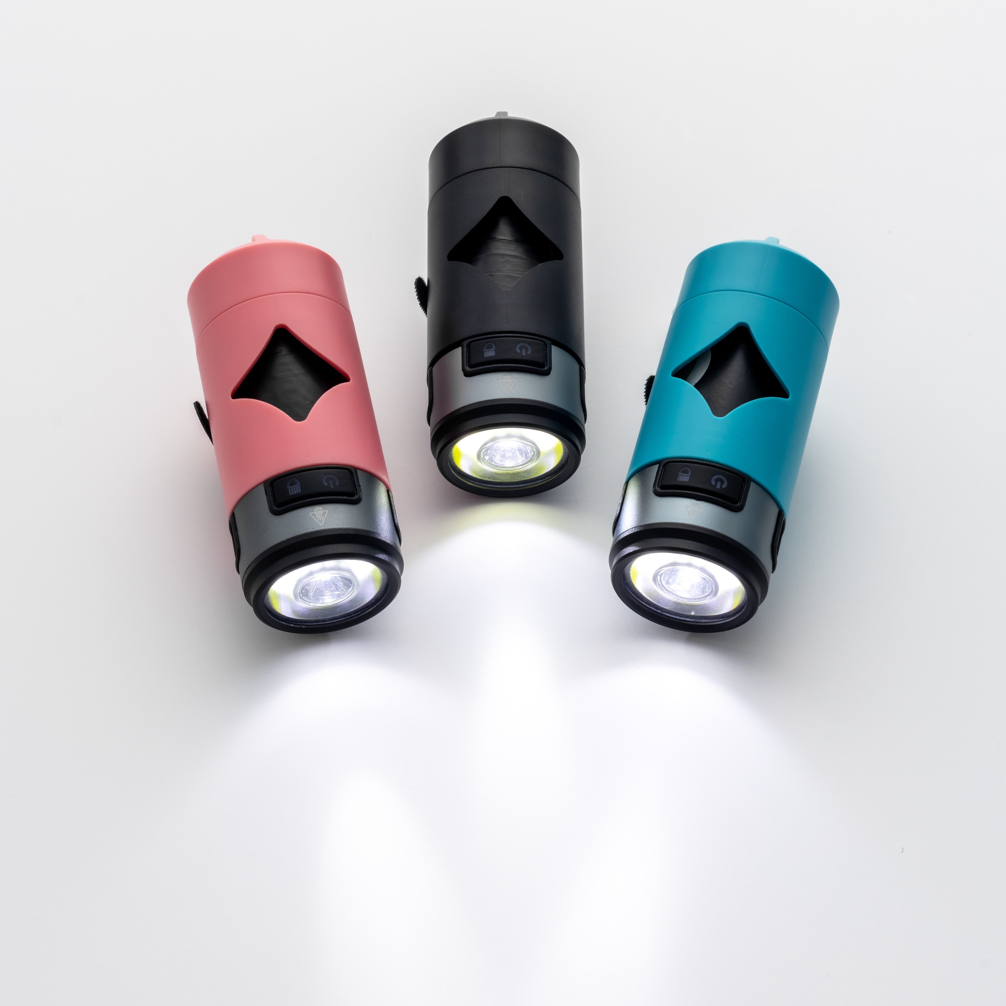 Three illuminated waste bag holders in red, black, and blue on a white background