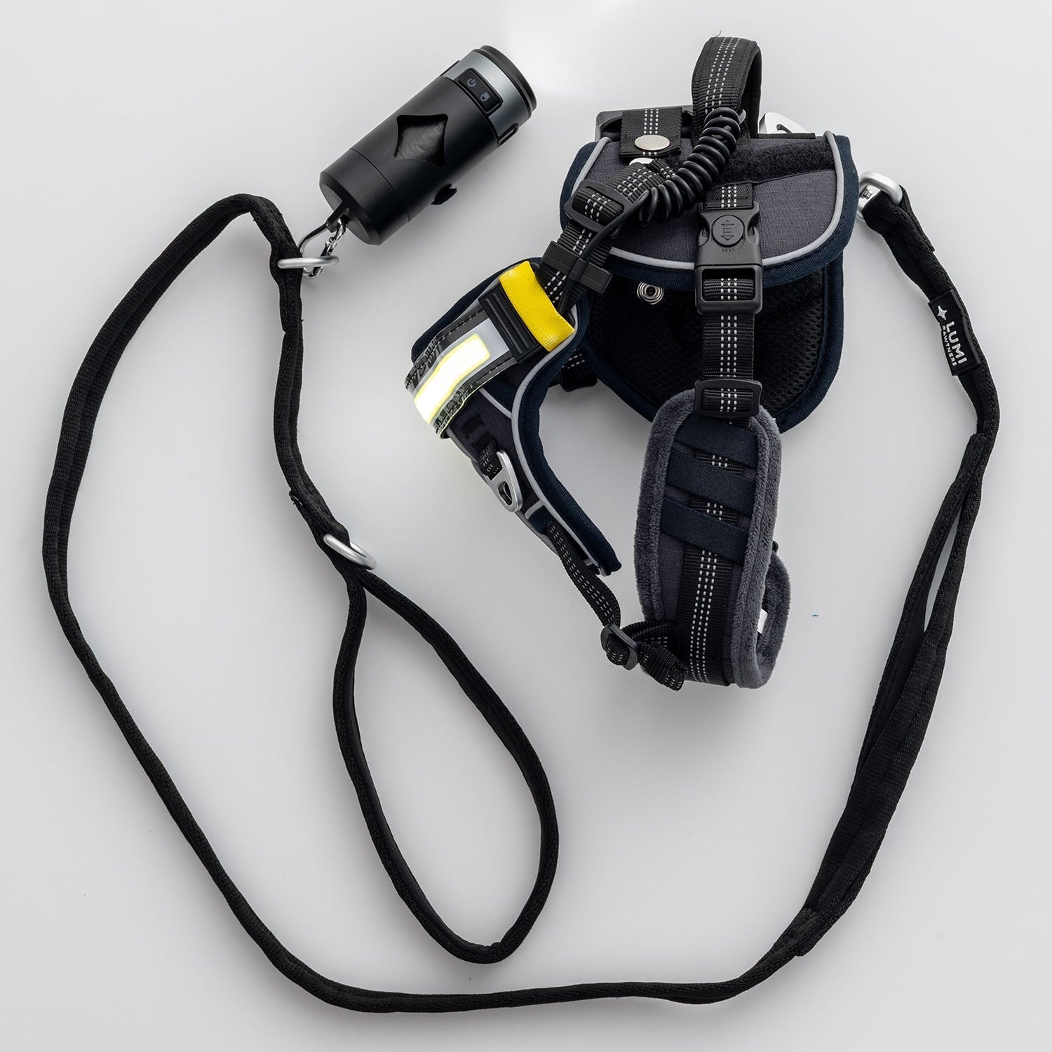 Bag holder with leash and harness on a white background